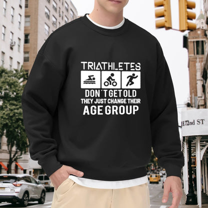 "Triathletes Don’t Get Old – They Change Age Groups" Humor Crewneck Sweatshirt